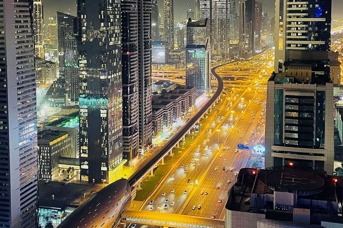 Dubai skyline and highway at night
